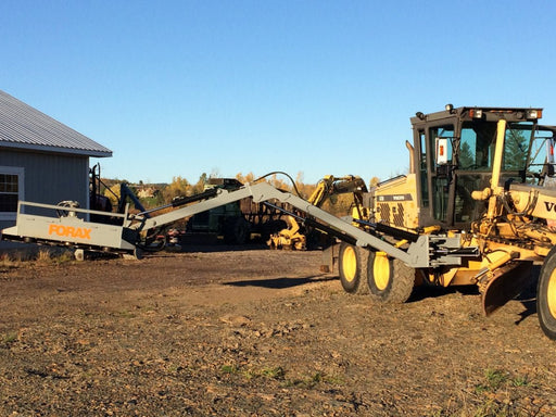 Forax grader implement boom in use on a motor grader, shown during roadside vegetation and maintenance operations