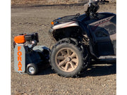 ATV with a small engine attached on a gravel surface