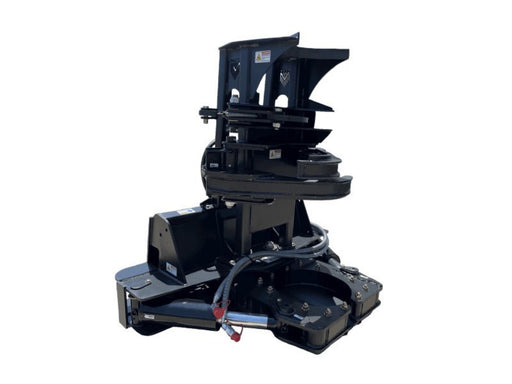 Skid steer forestry shear attachment with hydraulic clamping arms and heavy-duty blade housing.