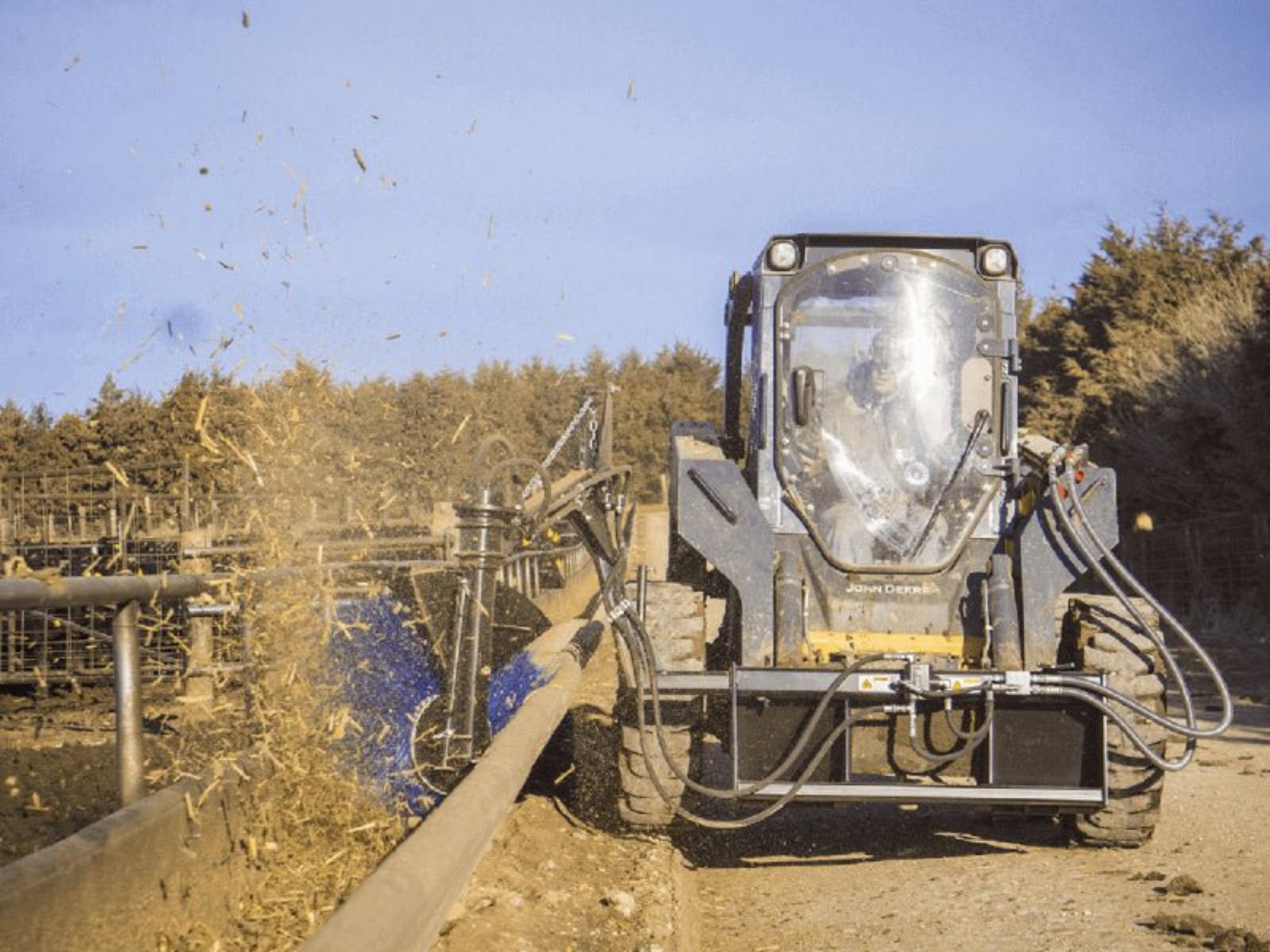 Feed Bunk Sweeper for Skid Steers | Maxx Attachments — LandBoss Equipment